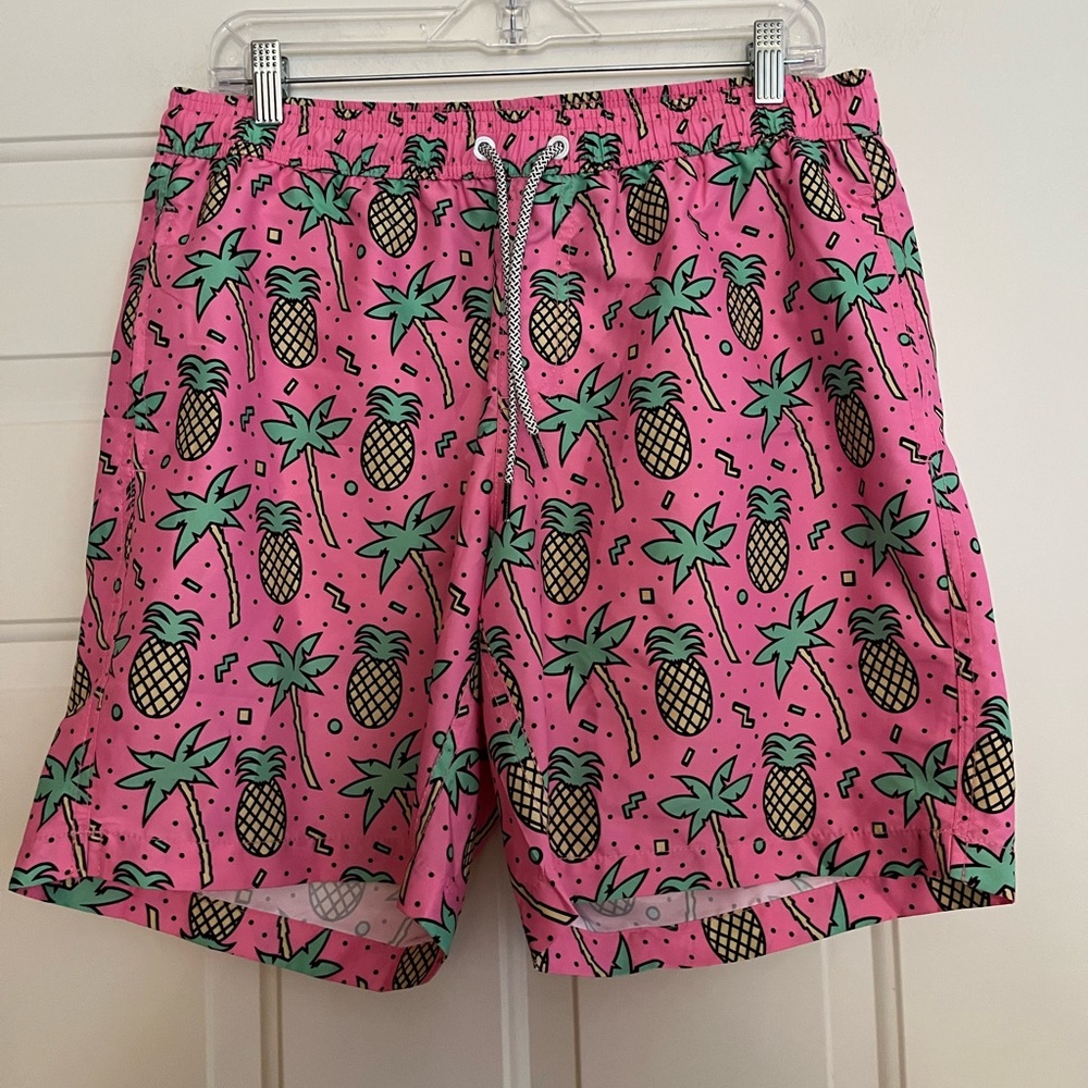 Men’s Maamgic beach bliss pink with pineapple elastic waist swim trunk. Large